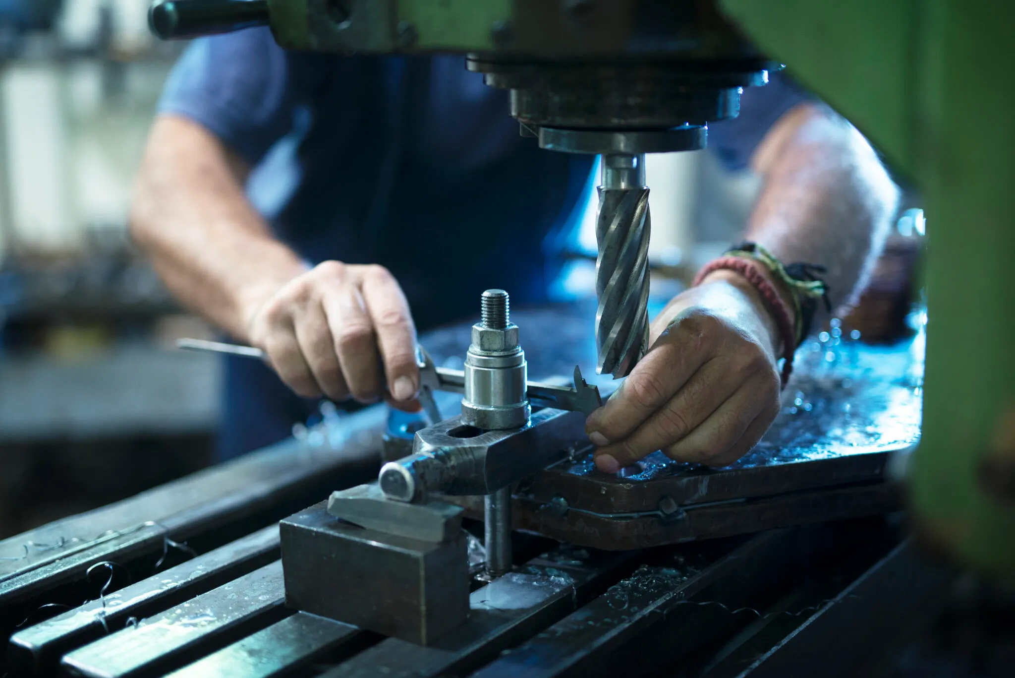 CNC machine operator working on precision machining process in India